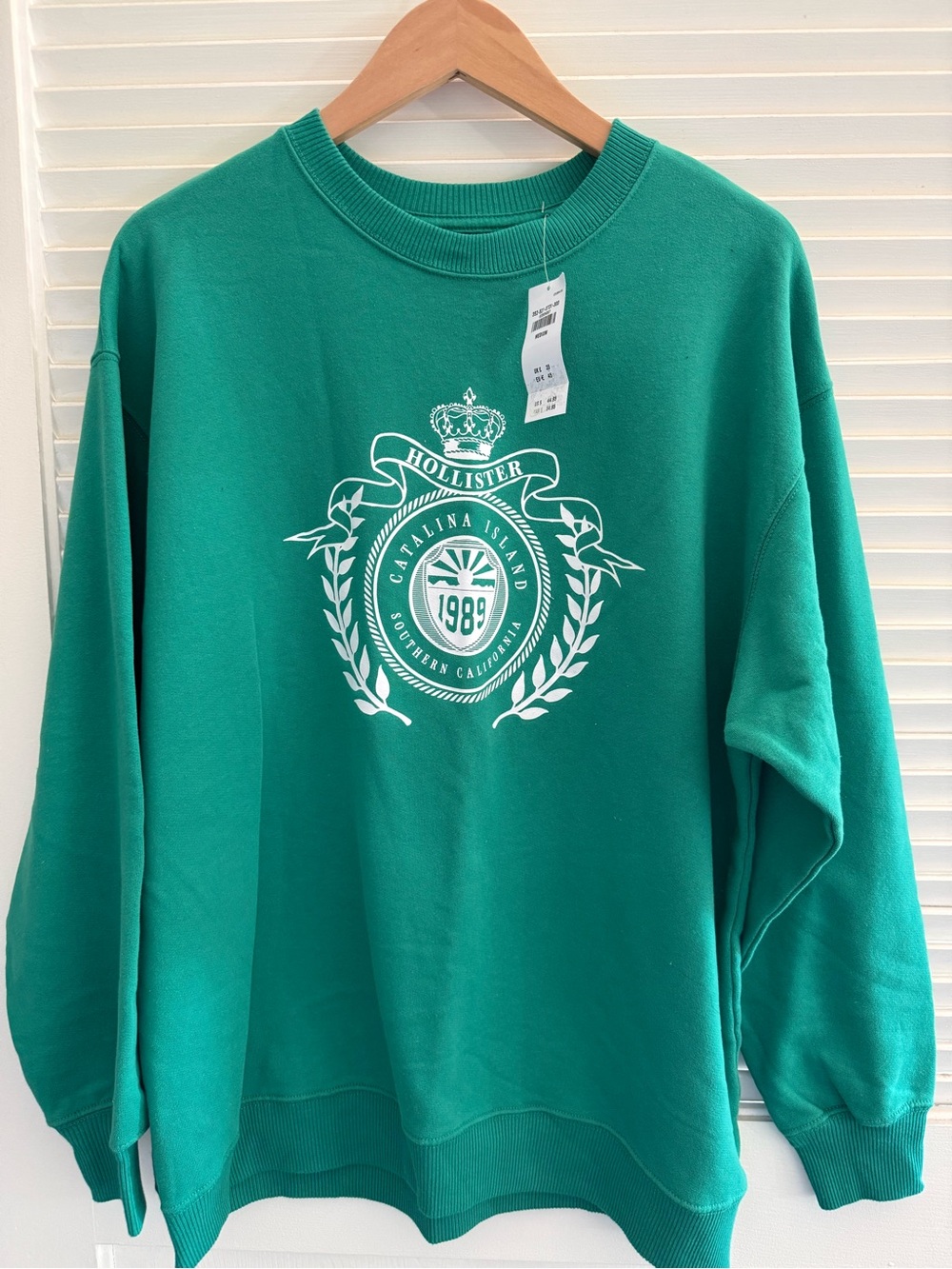 New. Hollister Catalina Island Sweatshirt with green sweatshirt.